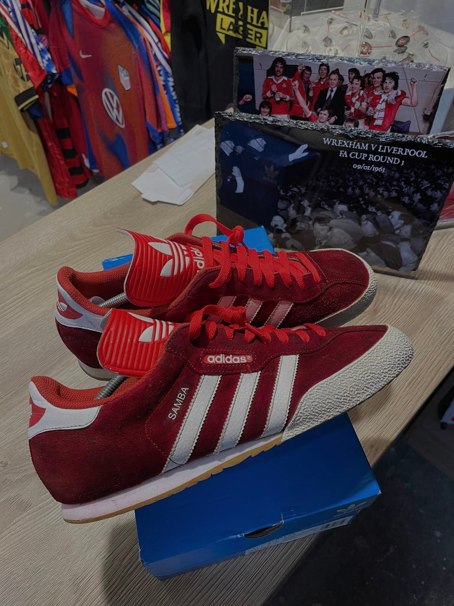 A pair of restored adidas trainers